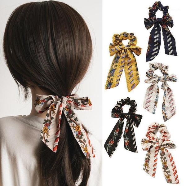 bohemian floral printed ribbon bow hair scrunchies scarf ponytail women vintage accessories ties elastic band c3i71 
bohemian floral printed ribbon bow hair scrunchies scarf ponytail women vintage accessories ties elastic band c3i71