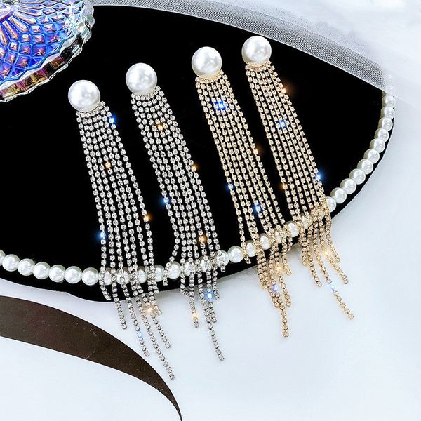 s925 silver needle popular long pearl tassel full diamond earrings elegant temperament rhinestone claw chain super, Golden
s925 silver needle popular long pearl tassel full diamond earrings elegant temperament rhinestone claw chain super, Golden