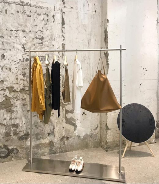 clothing store display rack commercial furniture women's side cloth hangers stainless steel bottom box middle island clothes hanger rod
clothing store display rack commercial furniture women's side cloth hangers stainless steel bottom box middle island clothes hanger rod