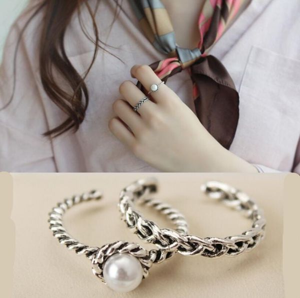 retro 2 pcs sets rotating ring twist woven pearl open silver plated ring whoelsale, Golden;silver
retro 2 pcs sets rotating ring twist woven pearl open silver plated ring whoelsale, Golden;silver