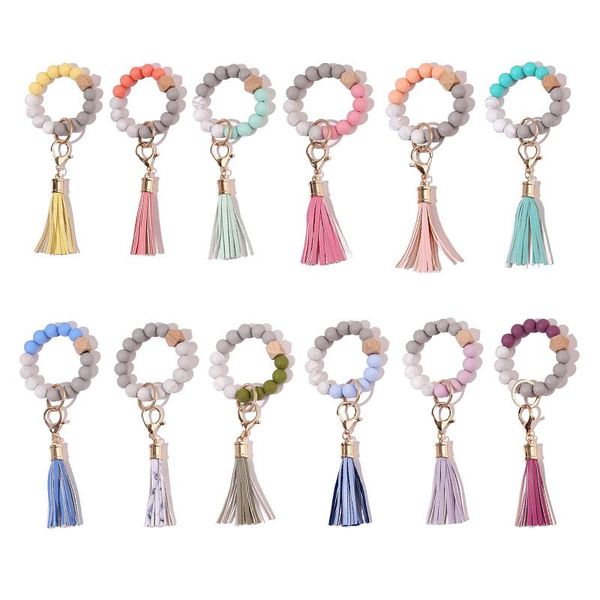 silicone beaded bangle keychain with tassel for women party favor, wristlet key ring bracelet
silicone beaded bangle keychain with tassel for women party favor, wristlet key ring bracelet