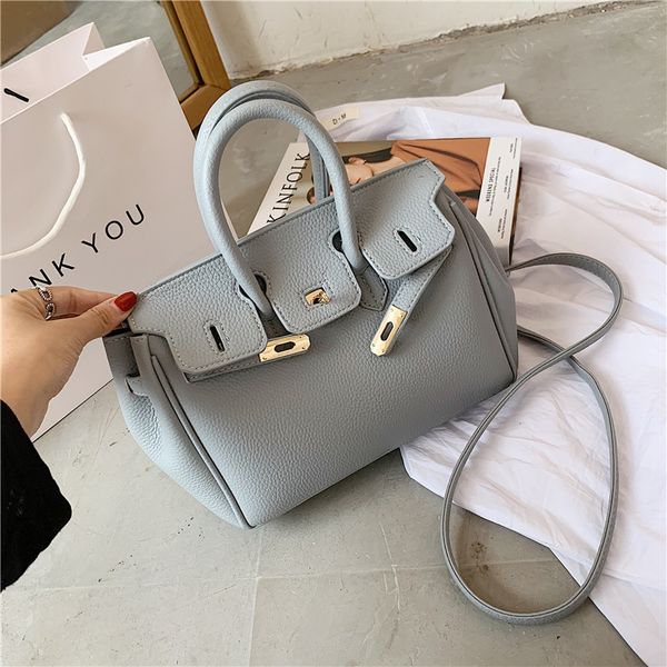 design s new style lychee pattern portable one shoulder oblique cross fashion women's bag
design s new style lychee pattern portable one shoulder oblique cross fashion women's bag