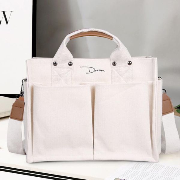 female bags large-capacity multi-pocket handbag casual one-shoulder messenger student canvas bag
female bags large-capacity multi-pocket handbag casual one-shoulder messenger student canvas bag