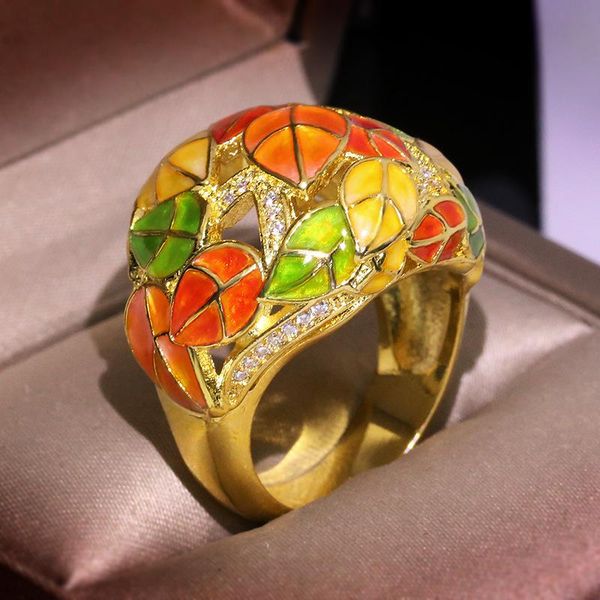 creative yellow gold color ring female retro colorful enamel exaggerated flower leaf cluster rings, Golden;silver
creative yellow gold color ring female retro colorful enamel exaggerated flower leaf cluster rings, Golden;silver