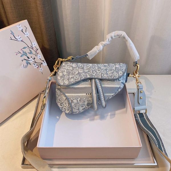 luxury handbags and storage women canvas saddle packbag handbag designer crossboby bag ladies shoulder packet presbyopia
luxury handbags and storage women canvas saddle packbag handbag designer crossboby bag ladies shoulder packet presbyopia