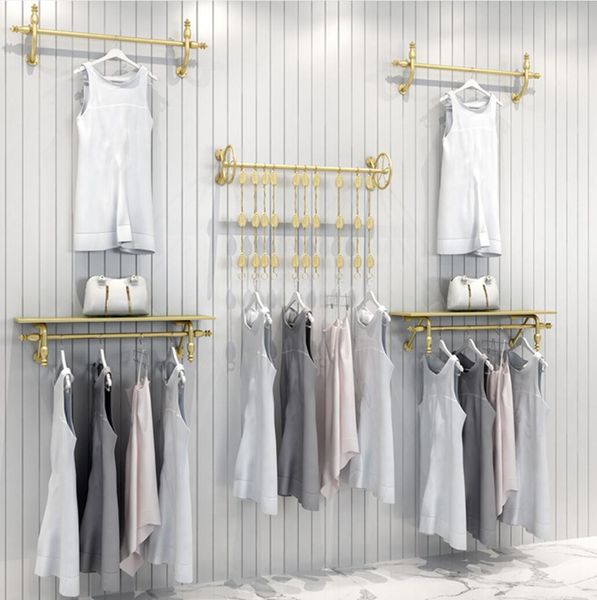 the display rack of clothing store hangs commercial furniture children's cloth hang wall hanging clothes racks mall is shelf swith gold
the display rack of clothing store hangs commercial furniture children's cloth hang wall hanging clothes racks mall is shelf swith gold