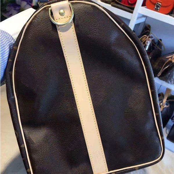 designers duffel bags 45cm 55cm luxury large capacity travel sale women men genuine leather shoulder fashion bag carry rivets with lock head
designers duffel bags 45cm 55cm luxury large capacity travel sale women men genuine leather shoulder fashion bag carry rivets with lock head