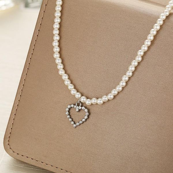 chokers fashion simulated pearl jewelry choker necklace women heart cross pendant necklaces for bijoux femme, Golden;silver
chokers fashion simulated pearl jewelry choker necklace women heart cross pendant necklaces for bijoux femme, Golden;silver