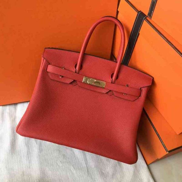 fashion women handbags purses cowhide real genuine leather tote luxurys designers bags version berkin gold silver buckle 
fashion women handbags purses cowhide real genuine leather tote luxurys designers bags version berkin gold silver buckle