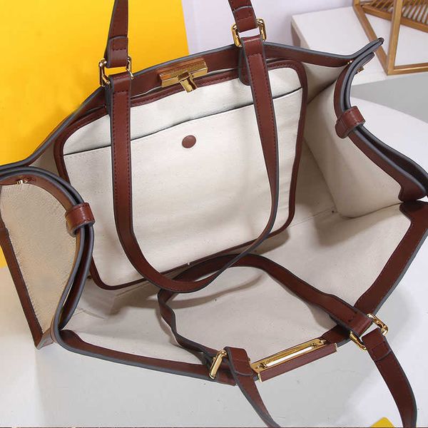 7a classic embroidered canvas tote bag women letter prints handbag quality shoulder back bags purse large retro gold swivel buckle
7a classic embroidered canvas tote bag women letter prints handbag quality shoulder back bags purse large retro gold swivel buckle