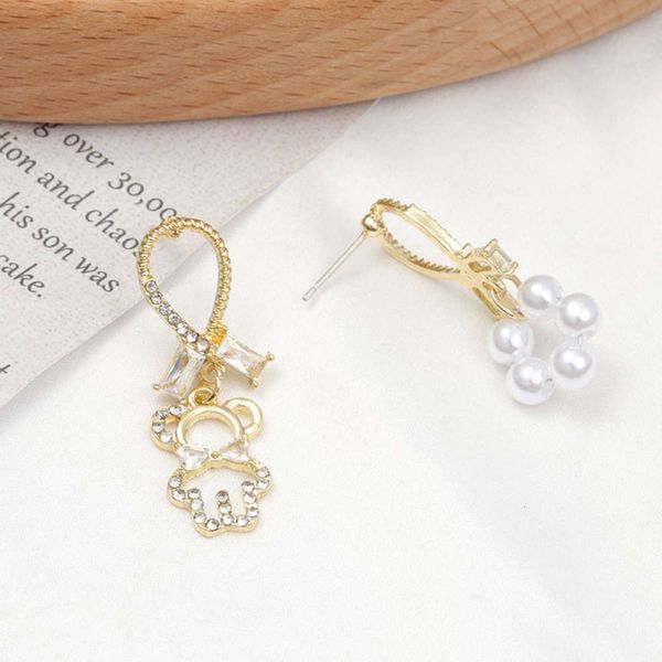 ins korean asymmetric pearl female diamond bear cute s925 silver needle earrings, Black
ins korean asymmetric pearl female diamond bear cute s925 silver needle earrings, Black