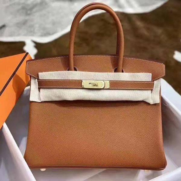 7a+tote bag handmade togo luxury designer handbags imitation brands classic fashion women purse cowhide leather pochette clutch with orange, Blue;pink
7a+tote bag handmade togo luxury designer handbags imitation brands classic fashion women purse cowhide leather pochette clutch with orange, Blue;pink