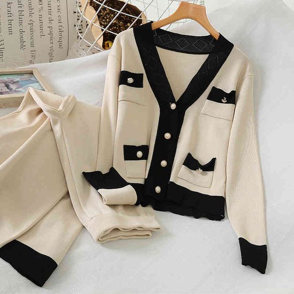 women's tracksuits fashion solid color v-neck single breasted cardigan + wide leg pants knitted two-piece set 83ng, Gray
women's tracksuits fashion solid color v-neck single breasted cardigan + wide leg pants knitted two-piece set 83ng, Gray