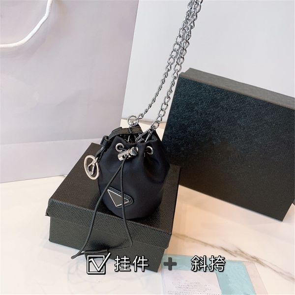 2021 black nylon canvas waterproof one-shoulder messenger bag buckets multifunctional portable drawstring pocket simple casual change backpa
2021 black nylon canvas waterproof one-shoulder messenger bag buckets multifunctional portable drawstring pocket simple casual change backpa