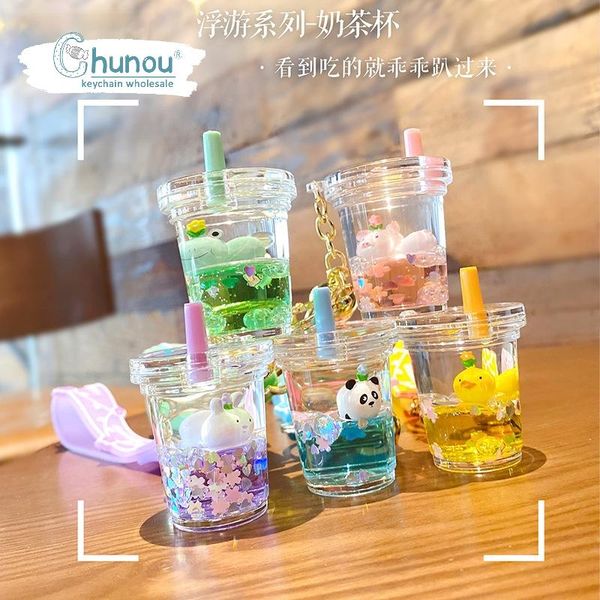 keychains creative papa doll milk tea keychain liquid drift bottle floating frog panda key chain for woman bag jewelry pendant wholesale, Silver
keychains creative papa doll milk tea keychain liquid drift bottle floating frog panda key chain for woman bag jewelry pendant wholesale, Silver