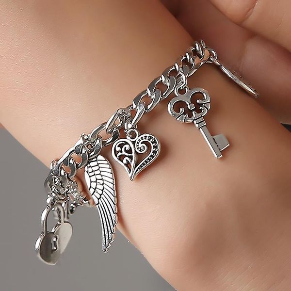 link, chain vintage silver color bracelet men and women elephant wing heart lock flower key star pendant friendship gift jewelry, Black
link, chain vintage silver color bracelet men and women elephant wing heart lock flower key star pendant friendship gift jewelry, Black