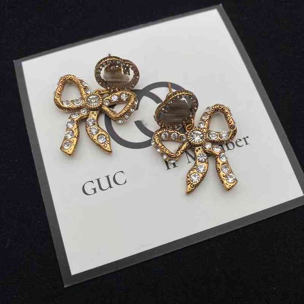 2023 designer new gujia inlaid rhinestone bow earrings female classic double interlocking earringskjnk, Golden
2023 designer new gujia inlaid rhinestone bow earrings female classic double interlocking earringskjnk, Golden