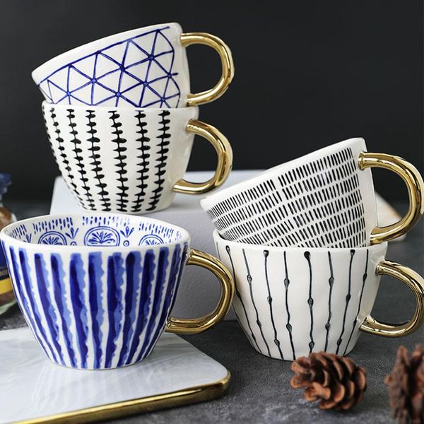 nordic creativec ceramic coffee cup with gold handle irrreglar large mouth mug for tea milk water kitchen office tableware decor mugs
nordic creativec ceramic coffee cup with gold handle irrreglar large mouth mug for tea milk water kitchen office tableware decor mugs