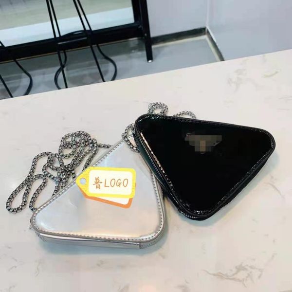 2021 fashion triangle dazzle solid color chain metal english messenger bag hand bar zero wallet
2021 fashion triangle dazzle solid color chain metal english messenger bag hand bar zero wallet