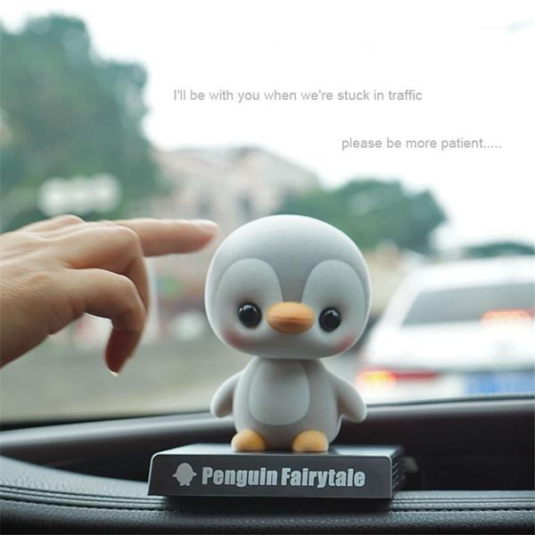 flocking penguin shaking head cute doll car decoration creative interior accessories1
flocking penguin shaking head cute doll car decoration creative interior accessories1