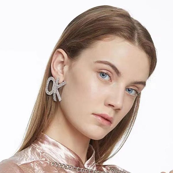 stud 2021 fashion claw chain series letters ok metal earrings women's jewelry accessories aretes de mujer, Golden;silver
stud 2021 fashion claw chain series letters ok metal earrings women's jewelry accessories aretes de mujer, Golden;silver