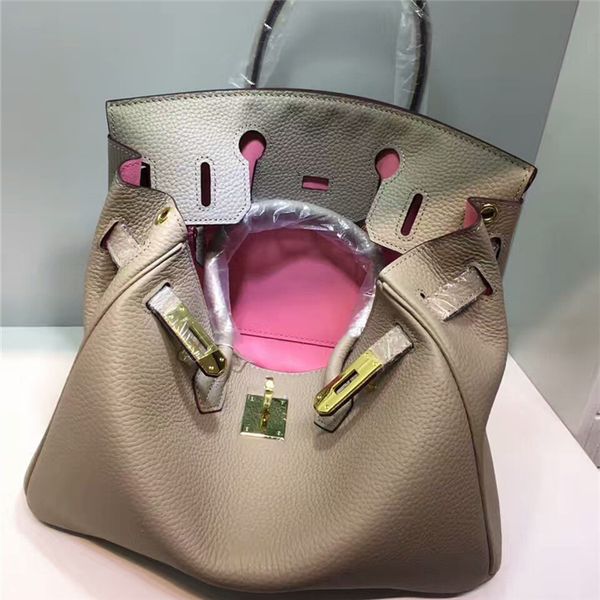 design purse fashion bag layer cowhide inner and outer color contrast matching women's
design purse fashion bag layer cowhide inner and outer color contrast matching women's