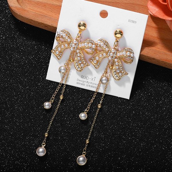 fashion luxury designer diamond pearl bow long tassel drop chandelier dangle stud earrings for woman girls, Golden;silver
fashion luxury designer diamond pearl bow long tassel drop chandelier dangle stud earrings for woman girls, Golden;silver