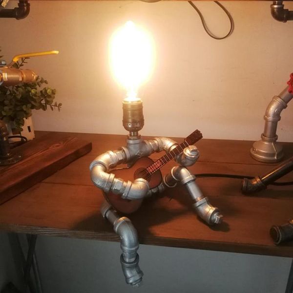 table lamps creative iron industrial water pipe robot playing guitar posture desk light home decoration livingroom bedside lamp
table lamps creative iron industrial water pipe robot playing guitar posture desk light home decoration livingroom bedside lamp