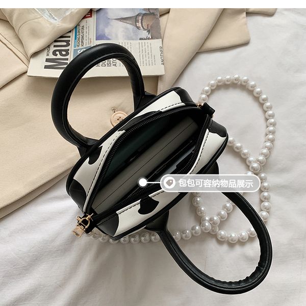 pu leather female small tote handbags fashion cow pattern women messenger bag simple pearl chain ladies small crossbody bags l00
pu leather female small tote handbags fashion cow pattern women messenger bag simple pearl chain ladies small crossbody bags l00