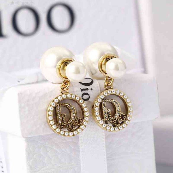 dio/christian d / di family female used brass earrings disc high version earrings, Red;brown
dio/christian d / di family female used brass earrings disc high version earrings, Red;brown