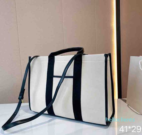 designers women totes with shoulder strap luxurys handbag fashion leather handle canvas material shopper bags
designers women totes with shoulder strap luxurys handbag fashion leather handle canvas material shopper bags