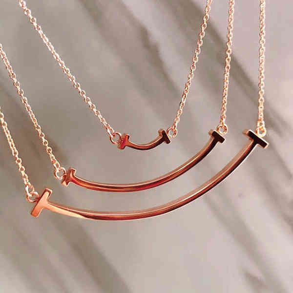 the new t family necklace 925 sterling silver plated 18k gold size smooth full diamond smile face pendant clavicle chain
the new t family necklace 925 sterling silver plated 18k gold size smooth full diamond smile face pendant clavicle chain