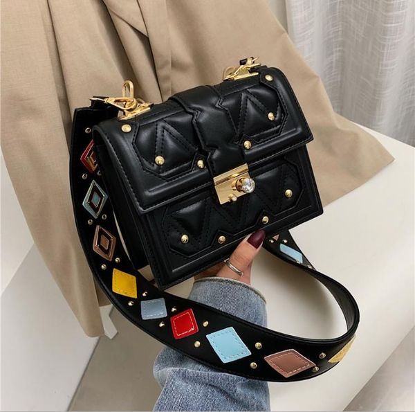fashion personality wide shoulder strap rivet bag 2021 female messenger rhombus one-shoulder fairy small square bags
fashion personality wide shoulder strap rivet bag 2021 female messenger rhombus one-shoulder fairy small square bags