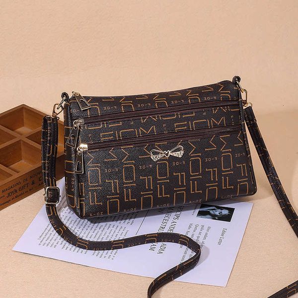 women's 2021 style satchel fashion summer one shoulder cross carrying middle aged and elderly women's bag
women's 2021 style satchel fashion summer one shoulder cross carrying middle aged and elderly women's bag