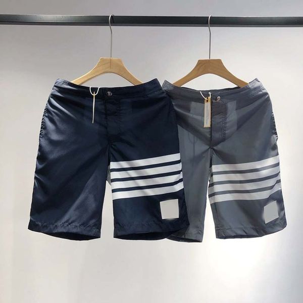 tb four bar ice silk satin elastic breathable fiber portable beach five point casual shorts tide brand, White;black
tb four bar ice silk satin elastic breathable fiber portable beach five point casual shorts tide brand, White;black