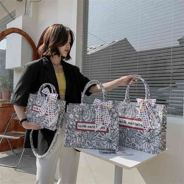 storage baagwomen's tote 2021 new fashion high capacity canvas embroidered bowknot niche design portable baggg bag
storage baagwomen's tote 2021 new fashion high capacity canvas embroidered bowknot niche design portable baggg bag