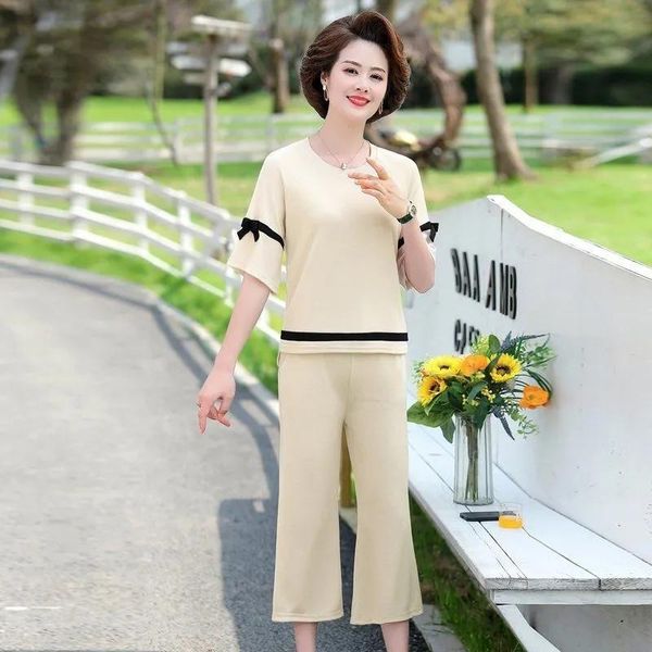 classy mom fashion two piece outfits casual summer o-neck half sleeve t shirts calf-length pants loose spliced plus size set women's, White
classy mom fashion two piece outfits casual summer o-neck half sleeve t shirts calf-length pants loose spliced plus size set women's, White