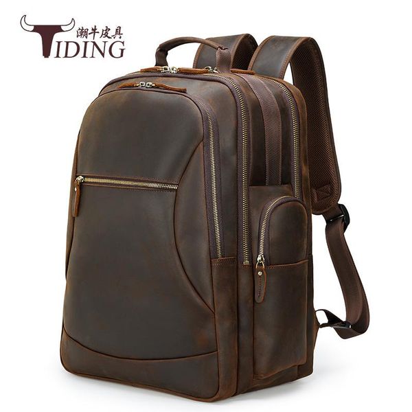 man 17" backpacks genuine leather business travel large capacity vintage backpack bag male
man 17" backpacks genuine leather business travel large capacity vintage backpack bag male