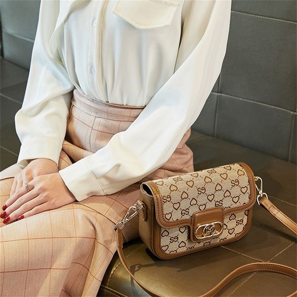 small bag female new fashion printing canvas chain design shoulder saddle single shoulder messenger bag versatile
small bag female new fashion printing canvas chain design shoulder saddle single shoulder messenger bag versatile