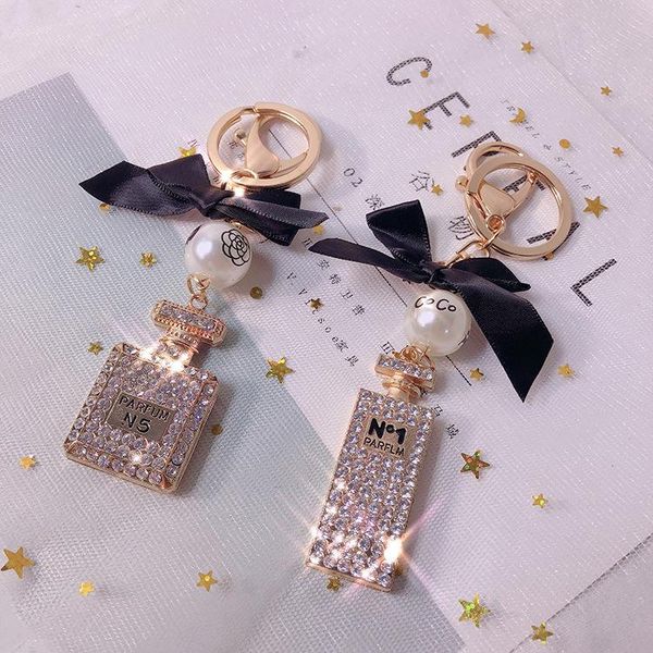keychains creative crystal perfume bottle key chain fashion pearl bow bag car pendant lady jewelry gift, Silver
keychains creative crystal perfume bottle key chain fashion pearl bow bag car pendant lady jewelry gift, Silver