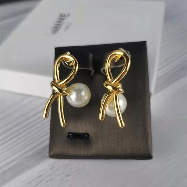 70% off new celi style knot pearl earrings, modern french temperament, personality and versatile earrings, Golden;silver
70% off new celi style knot pearl earrings, modern french temperament, personality and versatile earrings, Golden;silver