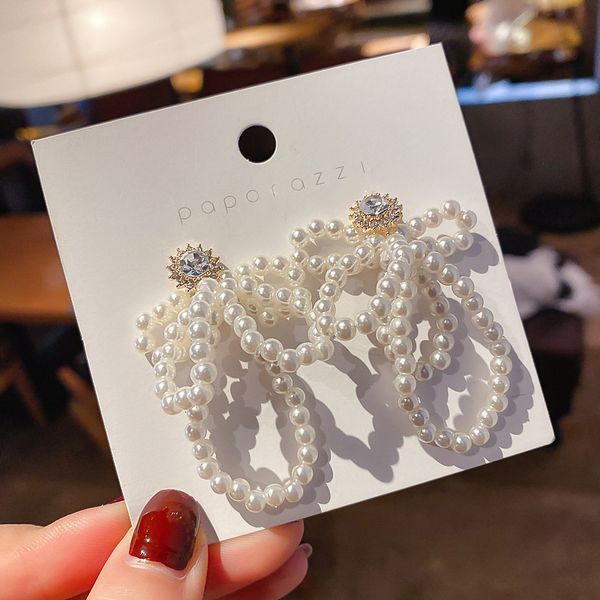 925 silver needle pearl bow earrings designer dongdamen small fresh trend earrings net red temperament earrings girl
925 silver needle pearl bow earrings designer dongdamen small fresh trend earrings net red temperament earrings girl