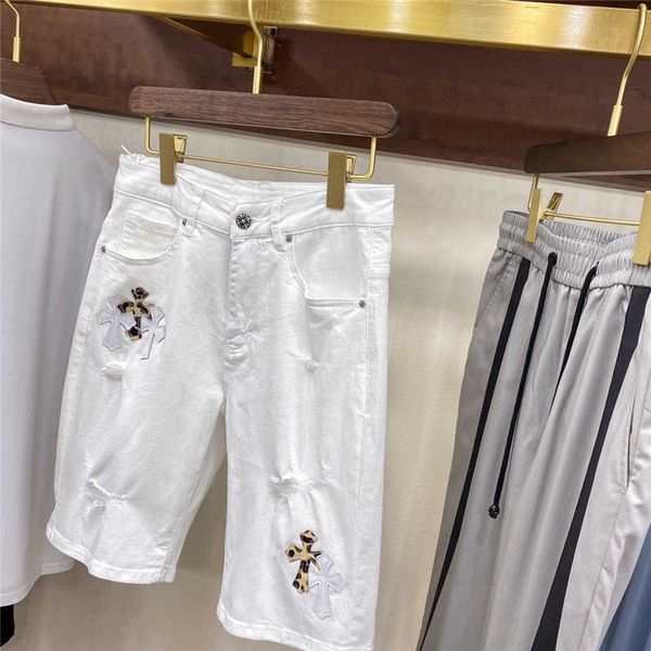 men's 21 summer fashion crosin cross hardware embroidery 5-point hole washing casual denim shorts, White;black
men's 21 summer fashion crosin cross hardware embroidery 5-point hole washing casual denim shorts, White;black
