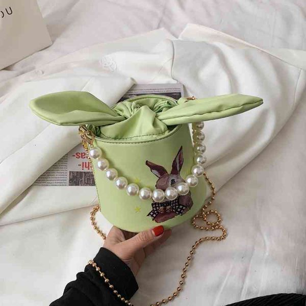 spring and summer 2021 single shoulder cross carrying portable bucket fashion korean cute cartoon graffiti women's bag trend
spring and summer 2021 single shoulder cross carrying portable bucket fashion korean cute cartoon graffiti women's bag trend