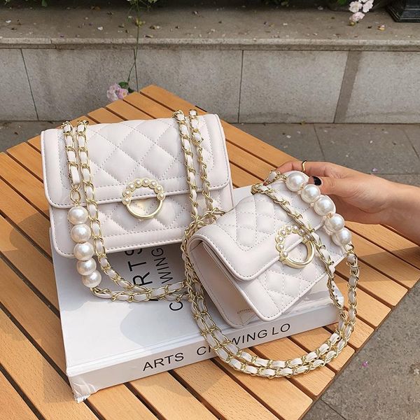 shoulder bags ladies pearl bag2021 messenger bag korean version one underarm diamond small square
shoulder bags ladies pearl bag2021 messenger bag korean version one underarm diamond small square