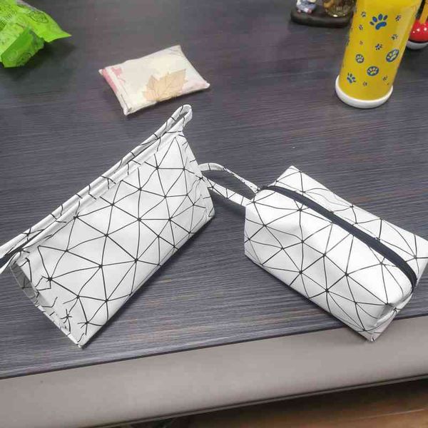 cosmetic bags ins portable pu leather net red bag travel large capacity washing storage zero wallet 
cosmetic bags ins portable pu leather net red bag travel large capacity washing storage zero wallet