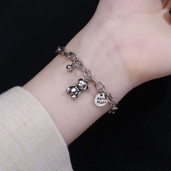 strands ancient cat ning letter round brand pendant girl's hand string female korean thai silver wind bead tassel bear bracelet, Black
strands ancient cat ning letter round brand pendant girl's hand string female korean thai silver wind bead tassel bear bracelet, Black