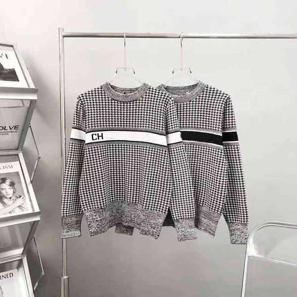 in early autumn of 21st century, the lattice letter knitted round neck leisure loose long sleeve sweater,, White
in early autumn of 21st century, the lattice letter knitted round neck leisure loose long sleeve sweater,, White