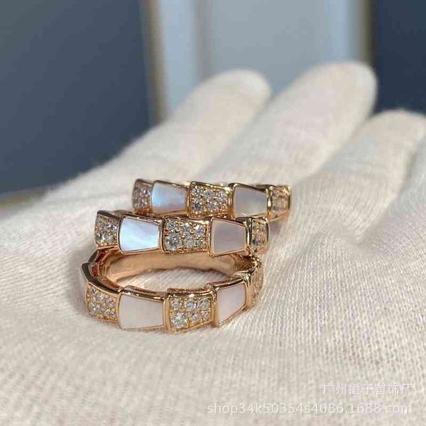 the new seiko s925 sterling silver baojia snake bone female wide natural white fritillaria ring simple temperament
the new seiko s925 sterling silver baojia snake bone female wide natural white fritillaria ring simple temperament