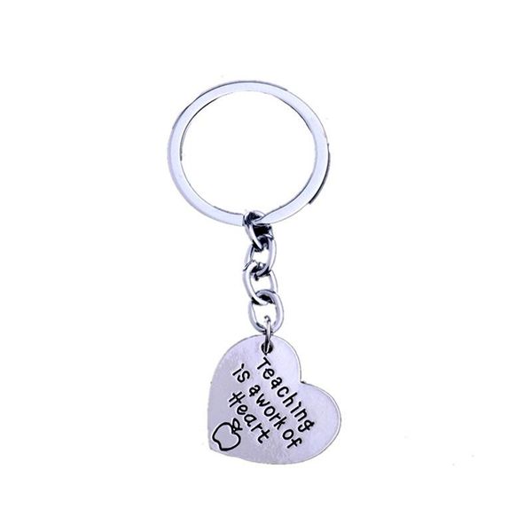 keychains teaching is a work of heart shaped teacher keychain key ring, Silver
keychains teaching is a work of heart shaped teacher keychain key ring, Silver